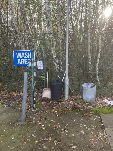 Wash area at a FedEx depot before installation of a Nilfisk 400HS DTE system. Existing setup prior to full pressure washer install and site modifications.